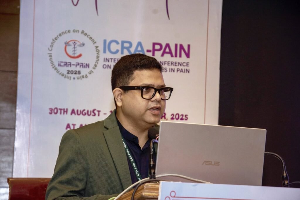 Dr. Shovan Kumar Rath speaking at International Pain Conference 2025, representing Pain Free Odisha and sharing advances in pain management